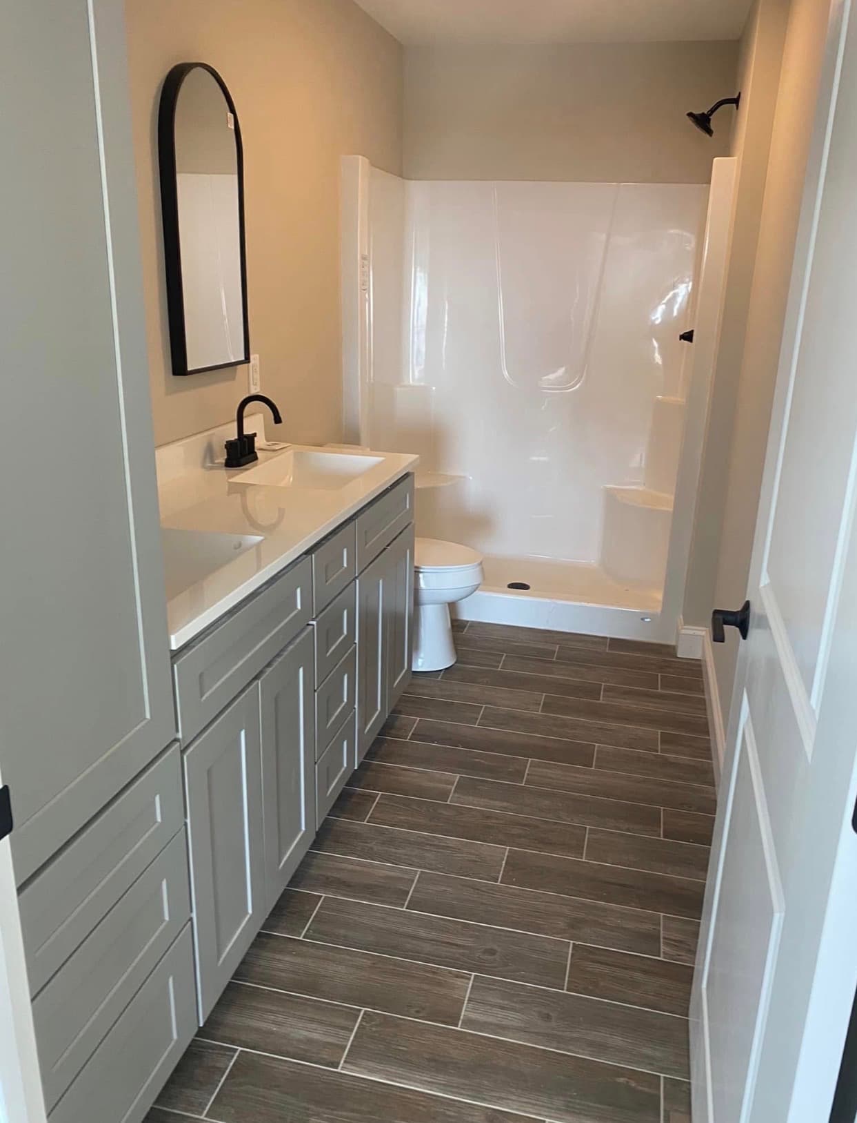 New bathroom plumbed and finished in a new-construction house
